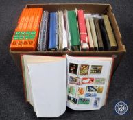 A box containing large quantity of assorted stamps,