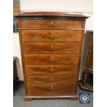 A 19th century mahogany seven drawer chest,