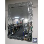 An all glass Venetian style mirror