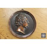 A circular bronze relief plaque of Johann Wolfgang von Goethe,