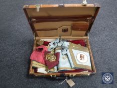 A brown leather briefcase containing Masonic regalia
