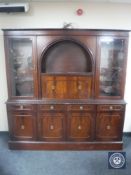 A reproduction mahogany cocktail display cabinet