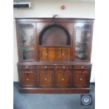 A reproduction mahogany cocktail display cabinet