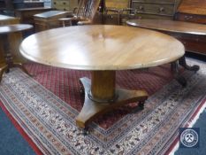 A circular Victorian mahogany tilt top breakfast table