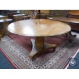 A circular Victorian mahogany tilt top breakfast table