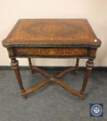 A continental style ormolu mounted inlaid walnut turnover top tea table,