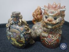 A large decorative Japanese flask vase together with a large dragon ornament CONDITION