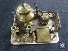 A tray of brass candlesticks, fire front,