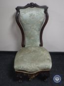 A Victorian mahogany shaped back bedroom chair