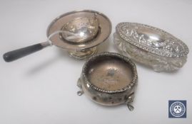 A silver salt together with a silver strainer on stand and a silver mounted dressing table pot