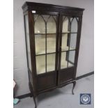 A Victorian mahogany display cabinet on cabriole legs