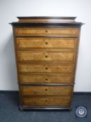 A late 19th century inlaid walnut chest on chest