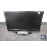 A Toshiba 22 inch LCD combi DVD TV with remote