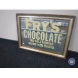 A gilt and silvered framed mirror bearing Fry's Chocolate advertisement