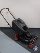 A Flymo petrol lawn mower