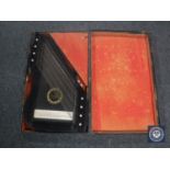 An early 20th century cased Royal harp zither