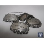 Four silver decanter labels (4)