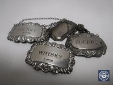 Four silver decanter labels (4)