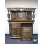 An early 20th century oak court cupboard,