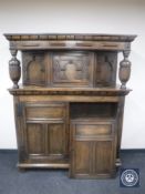 An early 20th century oak court cupboard,