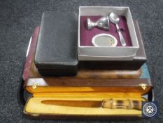 A tray of silver plated cutlery, boxed cruet set,