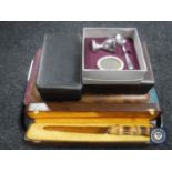 A tray of silver plated cutlery, boxed cruet set,