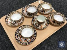 A collection of 19th century Royal Crown Derby teacups and saucers