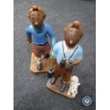 Two figures of Tintin