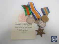 Four service medals to include 1914-1918 British War Medal awarded to PTE. R. E.