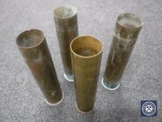 Four trench art brass shells