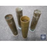 Four trench art brass shells