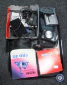 A tray of small electrical items, Fujifilm camera, digital camera, pair of binoculars,