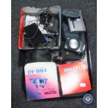 A tray of small electrical items, Fujifilm camera, digital camera, pair of binoculars,