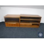 A late 20th century teak entertainment stand together with similar TV stand