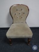 A Victorian mahogany framed bedroom chair upholstered in buttoned dralon