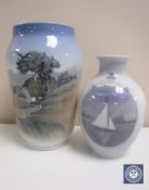 Two Royal Copenhagen vases depicting a rural landscape and a yacht,