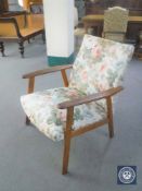 A mid 20th century Danish teak armchair