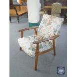 A mid 20th century Danish teak armchair