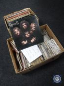 Two boxes of LP's to include Queen, Elvis, classic rock, singles, The Smiths,
