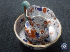 An ironstone jug and basin in Imari colours