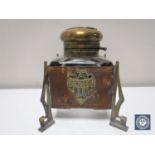 A late nineteenth century copper and brass mounted secessionist style inkwell