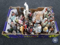 A box containing Japanese and continental figures,