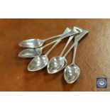 Six Georgian silver teaspoons.