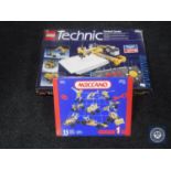 A Technic Lego control centre together with a Meccano No.