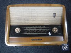 An HMV radio together with a collection of embassy vouchers and stamp albums