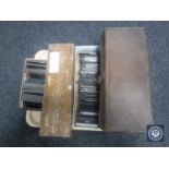 A tray of vintage leather case and three boxes of antique glass slides
