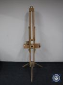 A large wooden Windsor and Newton easel