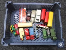 A crate of a quantity of die cast vehicles to include Dinky etc