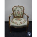 A continental salon armchair in tapestry fabric