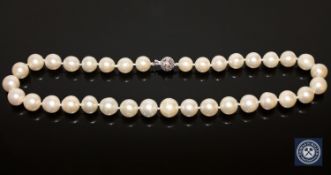 A 14ct white gold pearl and diamond necklace, thirty-five South Sea pearls,